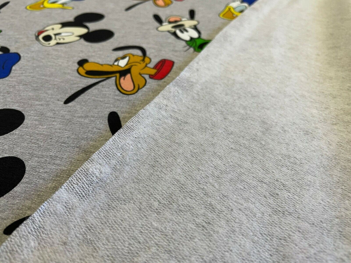 French Terry Stoff Mickey Maus Pluto Donald Duck Goofy 0,50m Disney Lizenzstoffe