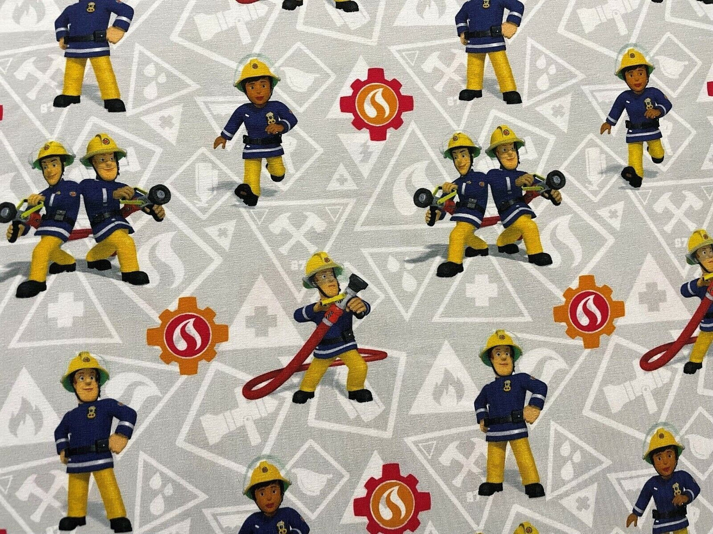 Baumwoll Jersey Stoff Feuerwehrmann Sam grau Preis gilt für 0,50m Lizenzstoffe