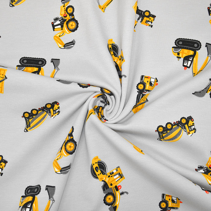 Baumwolle Jersey Stoff Baustellenfahrzeuge grau - Preis gilt für 0,50m